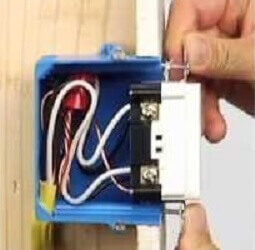 Fold the wires and put the replacement GFCI outlet into the outlet box