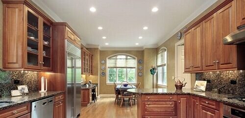 Recessed light fixture installation by professional lighting contractor